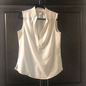 Dressy sleeveless blouse with zipper close neckline and mandarine collar